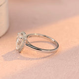 Halo Engagement Ring Featuring 2.0 CT Pear Moissanite 4