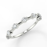 Dainty Pave Wedding Band Featuring 0.28 TCW Round Moissanite 1