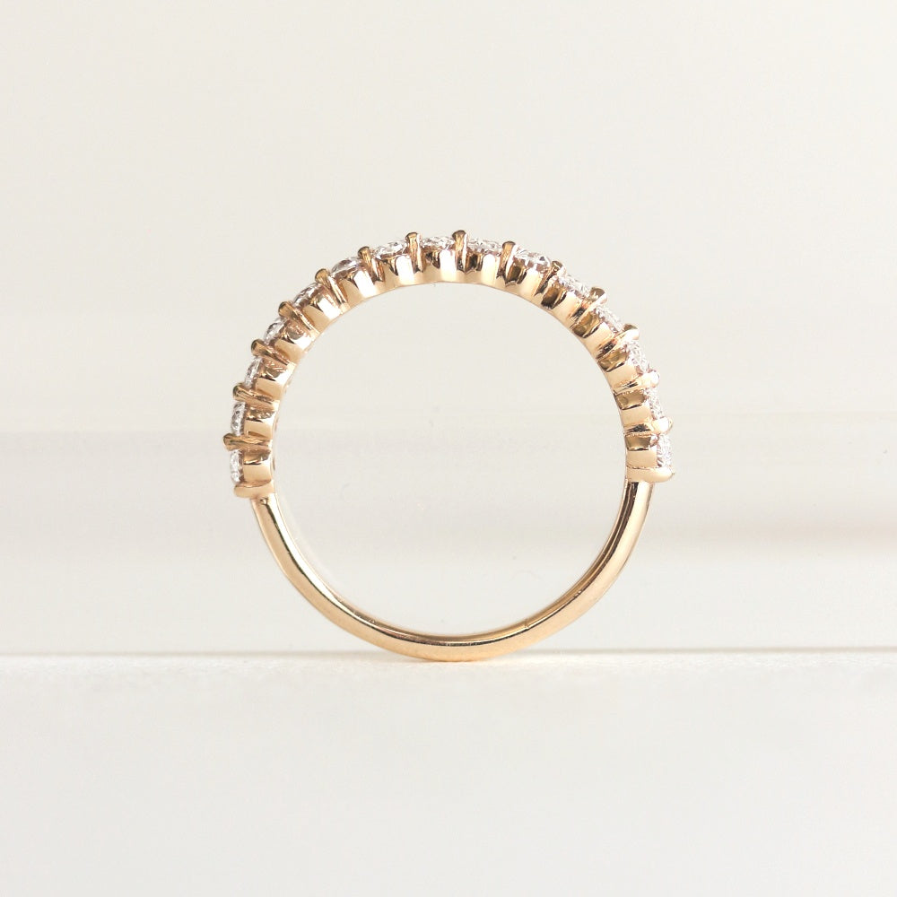 Half Eternity Wedding Band Featuring 0.54 TCW Oval Moissanite 7