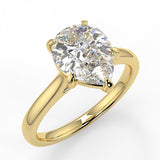 Solitaire Engagement Ring Featuring 1.33 CT Pear Moissanite 1