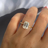 Solitaire Engagement Ring Featuring 1.91 CT Emerald Moissanite 23