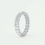 Eternity Prong Wedding Band Featuring 3.15 TCW Oval Moissanite 4