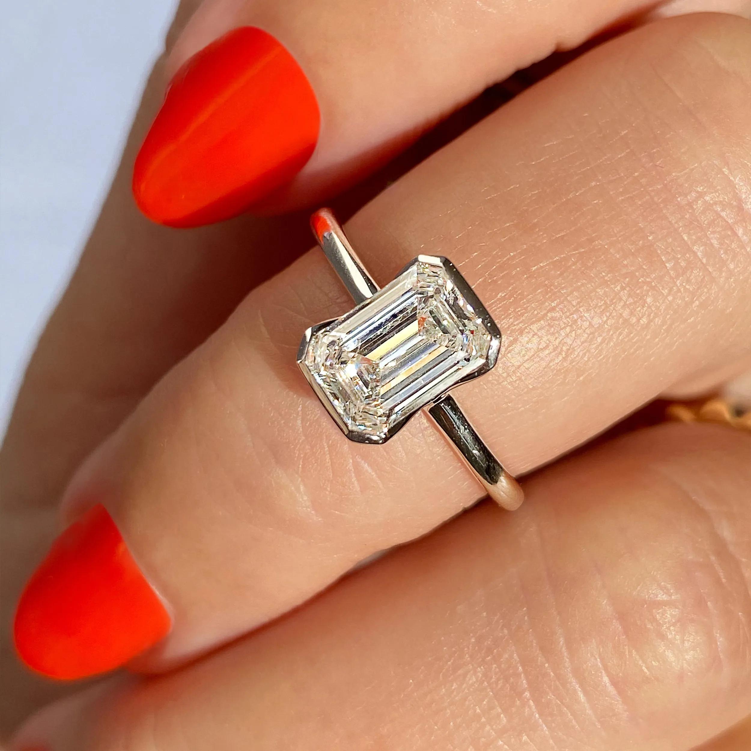 Solitaire Bezel Engagement Ring Featuring 1.91 CT Emerald Moissanite 23