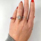 Solitaire Bezel Engagement Ring Featuring 1.91 CT Oval Moissanite 24