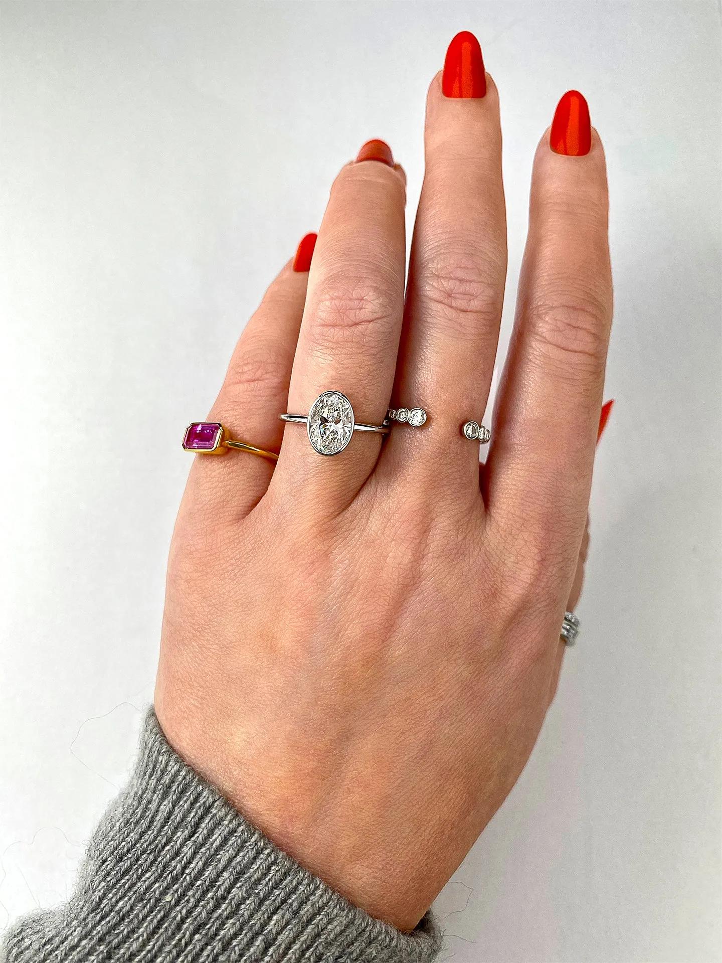 Solitaire Bezel Engagement Ring Featuring 1.91 CT Oval Moissanite 24