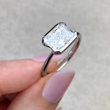 Solitaire Bezel Engagement Ring Featuring 1.91 CT Emerald Moissanite 22