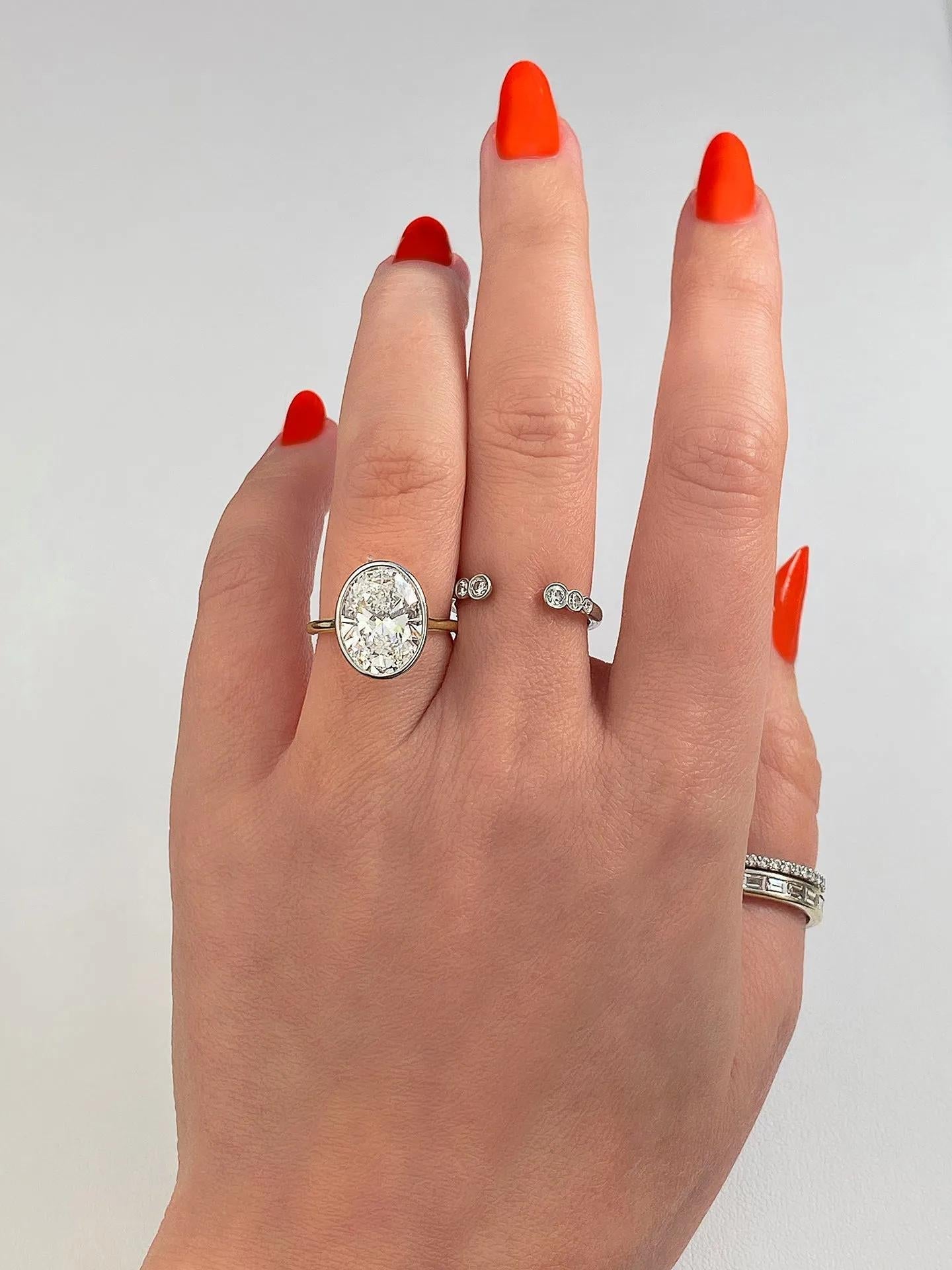 Solitaire Bezel Engagement Ring Featuring 1.91 CT Oval Moissanite 23