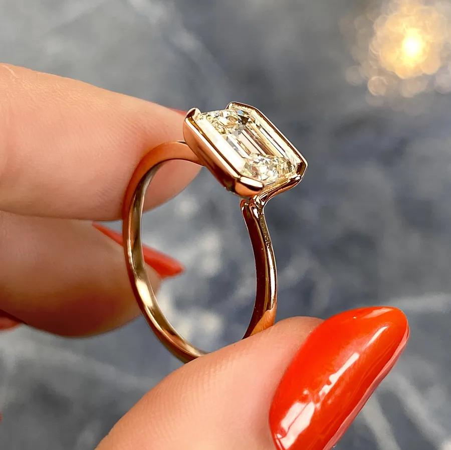 Solitaire Bezel Engagement Ring Featuring 1.91 CT Emerald Moissanite 27