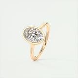 Solitaire Bezel Engagement Ring Featuring 1.91 CT Oval Moissanite 18