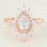 Cluster Engagement Ring Featuring 0.57 CT Pear Moissanite 1