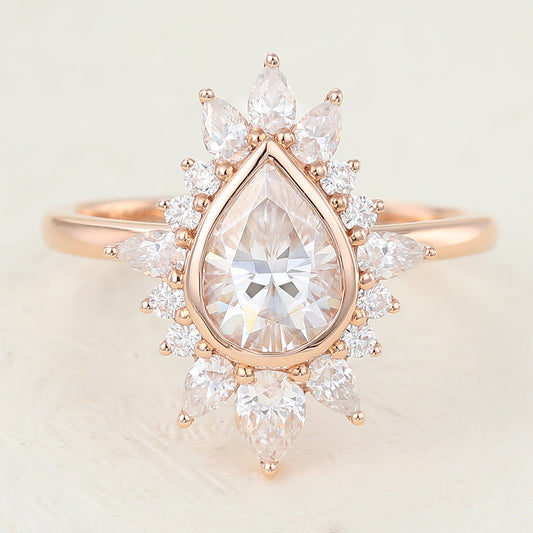 Cluster Engagement Ring Featuring 0.57 CT Pear Moissanite 1