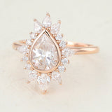 Cluster Engagement Ring Featuring 0.57 CT Pear Moissanite 6
