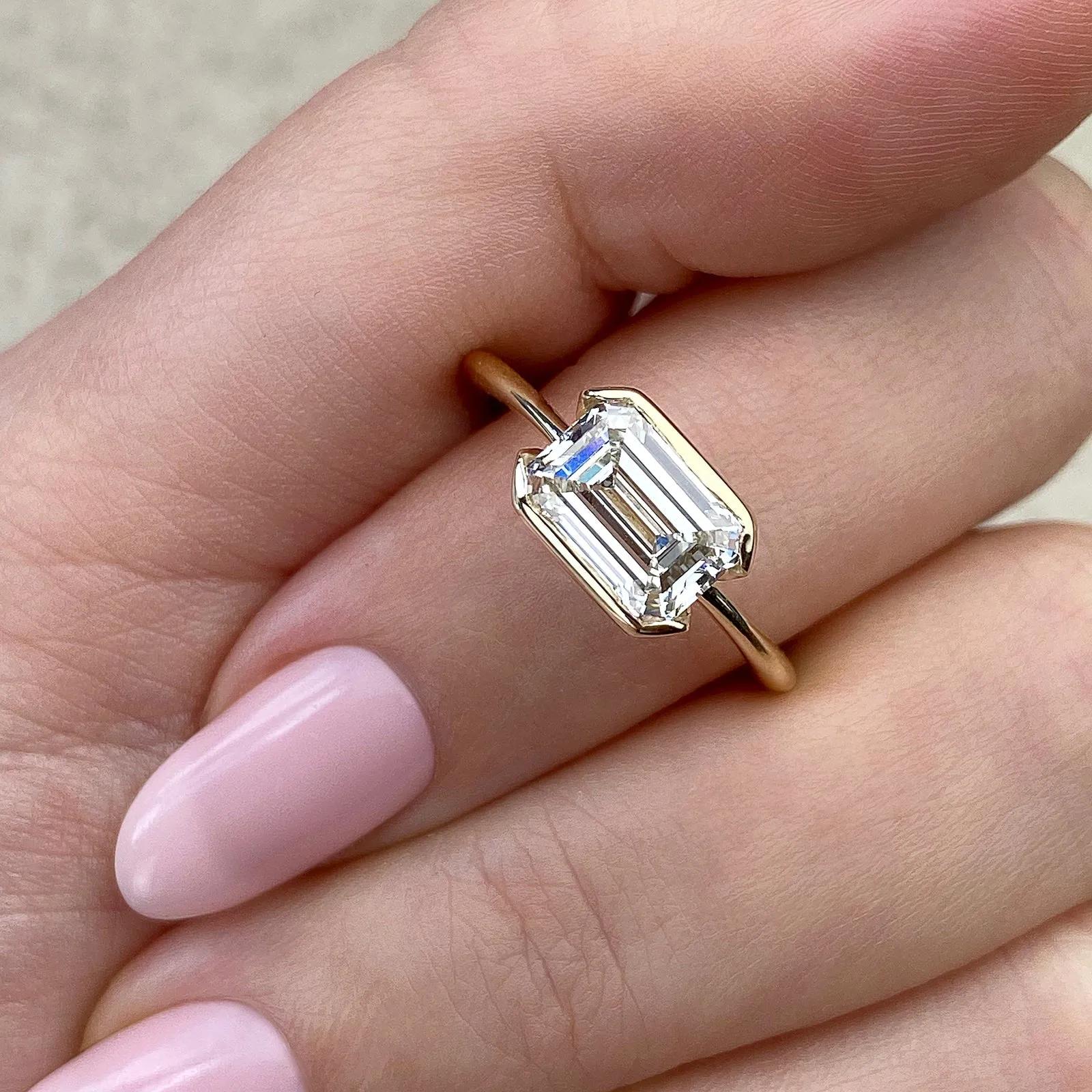 Solitaire Bezel Engagement Ring Featuring 1.91 CT Emerald Moissanite 29