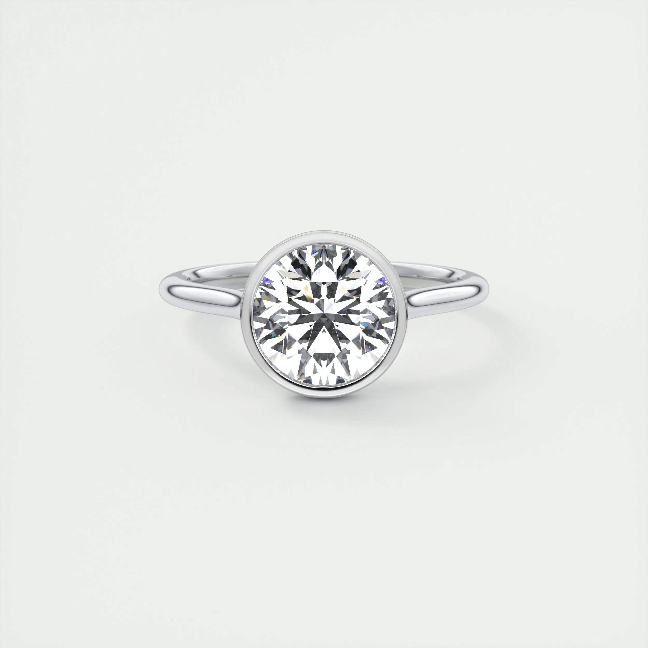 Solitaire Bezel Engagement Ring Featuring 2.0 CT Round Moissanite 1
